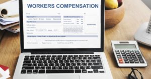 laptop computer with Workers Compensation form