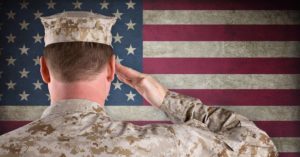 U.S. Marine saluting the American flag