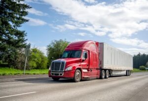 A red semi-truck drives down the road. What damages can I collect in a truck accident case?